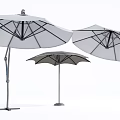 Modern Outdoor Umbrellas With Metal Frame And White Canopy For Patio Garden Use