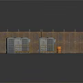 Gray Industrial Units With Yellow Safety Rails And Wooden Fence Panels Plus Orange Barrel
