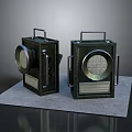 Black Vintage Portable Electronic Lamps With Metal Handles On Gray Mat