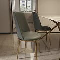 Elegant Modern Dining Table Set With Gray Upholstered Chairs And Golden Metal Legs