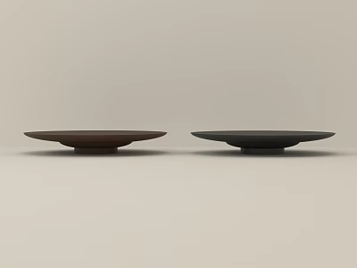 Two Brown and Black Ceramic Plates with Minimalist Design on Light Background 3d model