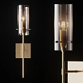 Modern Wall Sconce With Transparent Glass Shade And Brass Metal Base