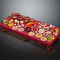 Assorted Food Spread with Roasted Turkey Cakes Fruits and Desserts on Long Red Tablecloth