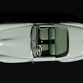 Classic Light Green Open Top Convertible Car With White Wheels And Sleek Design