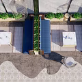 Modern Outdoor Public Chair With Blue Seats Green Plants And Square Tables On Paved Floor