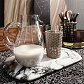 Stylish Glass Pitcher and Woven Tumbler on Marble Tray with Wooden Utensil Holder