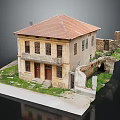 Old Two Story Building With Red Tile Roof Yellow Walls And Ruined Surrounding Grass