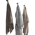 Stylish Hanging Clothes With Beige Storage Basket 3d model