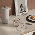 Decorative Ornament Set With White Kettle Clear Glass Cup And Magazine Cookie Fork Metal Ring