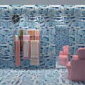MU CUI Specialty Store With Blue And White Patterned Walls Pink Armchair And Towels