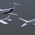 Three Different White Airplanes Flying In Clear Blue Sky With Clouds