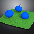 Green Grassy Surface With Three Blue Bulbous Shapes And Textured Design