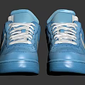 Light Blue Nike Sneakers with White Laces Swoosh Logo Leather Upper and Blue Sole