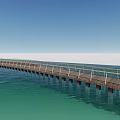 Scenic Bridge With Wooden Deck And Railing Stretching Over Turquoise Sea Under Blue Sky