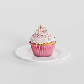 Fresh Pink Cupcake with Cream Frosting on White Plate and Swirl Decorations