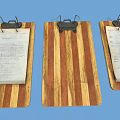 Three Wooden Clipboards With Metal Clips And Papers On Blue Background