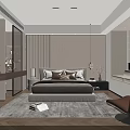 Modern Bedroom Interior With Gray Bedding Multiple Pillows Rug Brown Chair And Soft Lighting