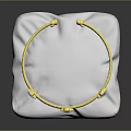 Elegant Gold Textured Bracelet With Blue Gemstones On White Display Cushion