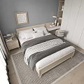 Double Bed With Wooden Frame Gray White Quilt White Pillows Bedside Table And Gray Walls