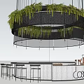 White Bar Counter with Hanging Circular Green Plants Decoration and Black Stools in Cafe