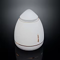 Sleek White Egg Shaped Computer Desktop Accessory With Golden Accent Lines And Compact Design 3d model
