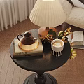 Black Coffee Table With Teapot Book Coffee Cup And Table Lamp Near Beige Sofa