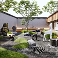 Traditional Japanese Courtyard Garden With Stones Trees Grass Lanterns And Deer Sculpture