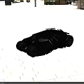 Powerful Black Batmobile Featuring Angular Design Large Tires And Futuristic Movie Style