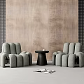 Leisure Sofa Set with Two Comfortable Chairs Small Table and Magazine on Textured Wall