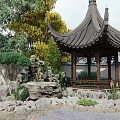 Traditional Chinese Garden Landscape With Pagoda Pavilion Rockery Green Plants And Stone Path