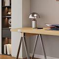 Modern Wooden Office Desk With Metal Legs Beige Chair Silver Lamp Laptop And Coffee Cup