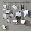 Creative Photo Wall With Family Photos And Art Prints Hanging On Strings