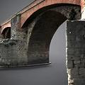 Ancient Stone Bridge With Red Brick Arches And Stone Masonry Piers