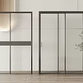 Modern Sliding Doors With Glass Panels And Black Metal Frame In Interior Design Space