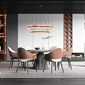 Modern Restaurant Interior With Round Dining Table Brown Chairs And Circular Pendant Lights