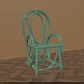 Green Curved Design Dining Chair Against Brown Wall With Herringbone Wood Floor