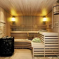 Wooden Sauna Room Interior Design With Wooden Benches Stone Walls Warm Lighting And Wooden Bucket