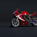 Red Sport Motorcycle With Sleek Design Black Seat And Silver Wheels