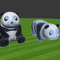 Two Adorable Panda Toys Sitting And Lying On Green Grassy Field