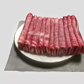Fresh Sliced Marbled Beef Arranged On White Plate For Serving