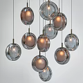Round Glass Pendant Lights With Gold Metal Accents Warm Illumination Modern Decor Design