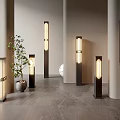 Modern Outdoor Lights With Sleek Post And Wall Designs Featuring Warm Glow And Green Plants