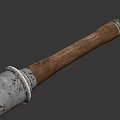 Ancient Weapon with Worn Metal Head and Textured Wooden Handle