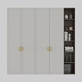 Modern Grey Wardrobe With Gold Round Handles And Open Shelves With Books