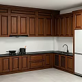 Traditional Dark Wood Kitchen Cabinets With Black Countertop Sink Stove And Refrigerator