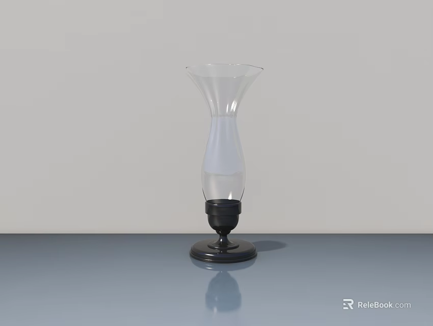 Modern Table Lamp With Transparent Vase Shaped Shade And Black Base On Gray Tabletop 3d model 