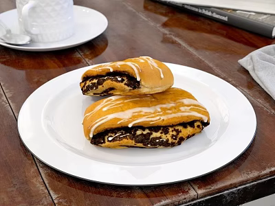 Freshly Baked Chocolate Filled Pastries With Sugar Glaze On White Plate 3d model