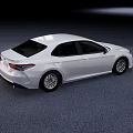 White Modern Sedan Car With Sleek Exterior Design And Stylish Wheels
