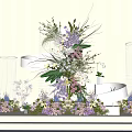 Decorative Floral Installation With Transparent Cylindrical Stands And Purple Pink White Flowers