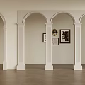 Interior With White Arched Doorways And Columns With Paintings On Wall And Brown Floor